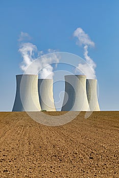 Nuclear power plant Temelin with field  and blue sky in Czech Republic Europe.