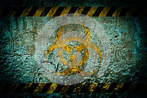 Nuclear radiation warning symbol on grunge wall background