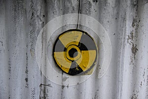 Nuclear reactor symbol. Round Ðºotating Ñ‚uclear and Ð¸iohazard Sign on the fence. Grunge biohazard symbol. Grunge biohazard sign