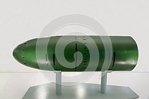 The nuclear warhead of the torpedo is green on a white background. Military equipment atom planes