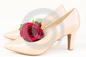 Nude colored high heels still life