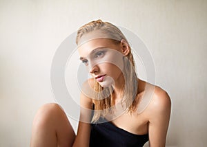 Nude fashion portrait of a white-haired girl