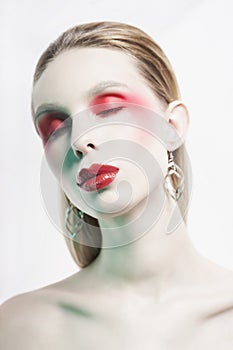 nude lady with colorful lipstick and artistic makeup