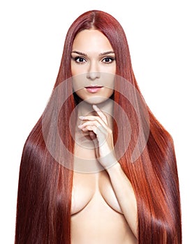 Nude woman with long red hair