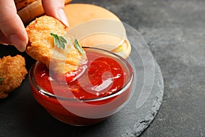 Nuggets in chili sauce and cheeseburgers