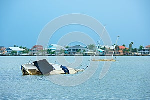 Nuisance abandoned sailboats in an intracoastal waterway bay in south Florida