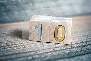 Number 10 Formed By Wooden Blocks On A Board