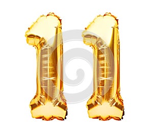 Number 11 eleven made of golden inflatable balloons isolated on white. Helium balloons, gold foil numbers. Party decoration,