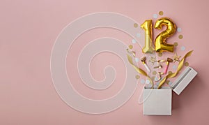 Number 12 birthday balloon celebration gift box lay flat explosion