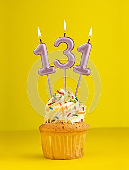 Number 131 candle - Birthday card design in yellow background