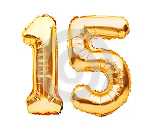 Number 15 fifteen made of golden inflatable balloons isolated on white. Helium balloons, gold foil numbers. Party decoration,