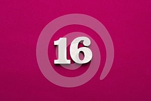 Number 16 - white number in wood on rhodamine red background