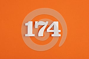 Number 174 - On orange foam rubber background