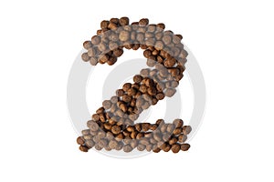 Number 2 made from dry pet food on a white background. Dietary therapeutic nutrition for dogs and cats