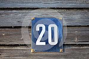 number 20 on a wooden  wall