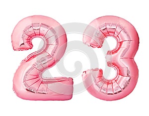 Number 23 twenty three made of rose gold inflatable balloons isolated on white background