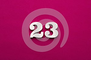 Number 23 - White wooden number on rhodamine red background
