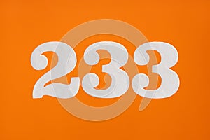 Number 233 - White digits on orange background