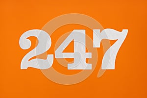 Number 247 - White digits on orange background