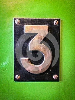 Number 3 sign , number three metal sign on green background