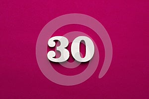 Number 30 - white number in wood on rhodamine red background