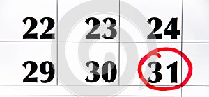 The number 31 in the calendar is circled in red circle on a blue background. A question mark near a number, everything around is