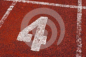 The number 4 at start point of running track or athlete track in stadium