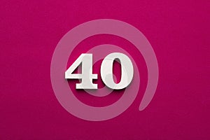 Number 40 - white number in wood on rhodamine red background