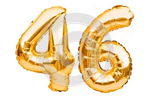 Number 46 forty six made of golden inflatable balloons isolated on white. Helium balloons, gold foil numbers. Party decoration,