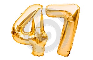 Number 47 forty seven made of golden inflatable balloons isolated on white. Helium balloons, gold foil numbers. Party decoration,