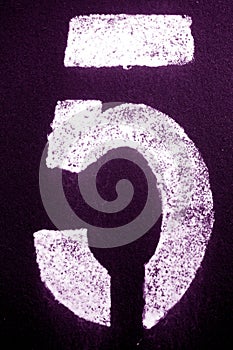 Number 5 in stencil on metal wall in purple tone