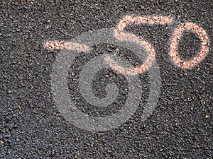 Number -50 on asphalt eng