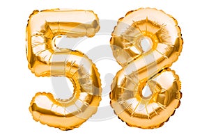 Number 58 fifty eight made of golden inflatable balloons isolated on white. Helium balloons, gold foil numbers. Party decoration,