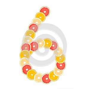 The number `6` made from sliced citrus fruits. Oranges, grapefruit. Isolated on white background