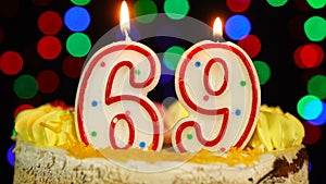 Number 69 Happy Birthday Cake Witg Burning Candles Topper.