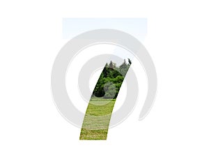 number 7 of the alphabet made with landscape with grass, forest and a blue sky