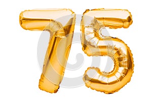 Number 75 seventy five made of golden inflatable balloons isolated on white. Helium balloons, gold foil numbers. Party decoration