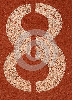 Number 8 on rubber flooring for running athletics