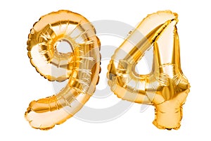 Number 94 ninety four made of golden inflatable balloons isolated on white. Helium balloons, gold foil numbers. Party decoration,