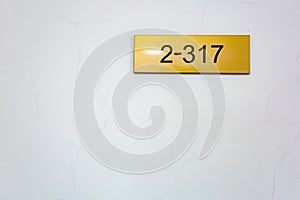 Number 2-317 against a light background