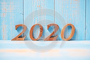 2020 number on blue wood background with copy space. Business Goals, Mission, Vision, Resolution, Happy New Year New Start and