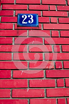 Number on brick wall photo