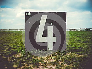 Number 4 countdown panel in Templehof Airport, Berlin, Germany