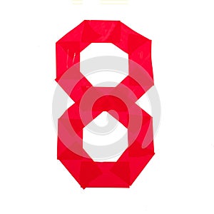 Number eight made from red scotch tape on a white background