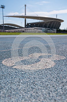 Number eight on running track lines.