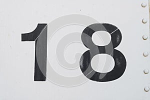 Number 18 eighteen white old metal background texture photo
