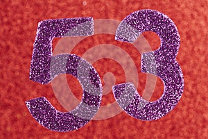 Number fifty-three purple color over a red background. Anniversary