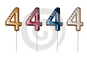 Number four shaped foil balloons in different colors. Isolated on white background. 3D rendered illustration