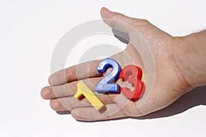 Number fridge magnets on hand