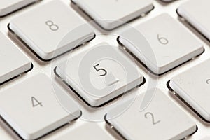 Number Keypad on a White and Grey Computer Keyboard